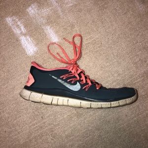 Pink and grey nike free